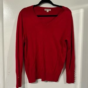 V neck sweater with button accent